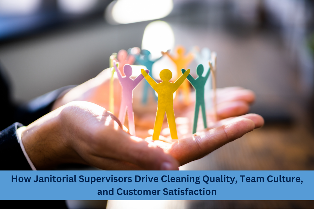 Business professional holding paper cutout figures of a team, symbolizing janitorial supervisors building cleaning quality, team culture, and customer satisfaction.