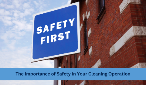 Safety First sign on a building exterior emphasizing the importance of safety in cleaning operations.